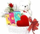 Gift Hamper with a Red Rose, Teddy, Velvet Heart and Chocolates.